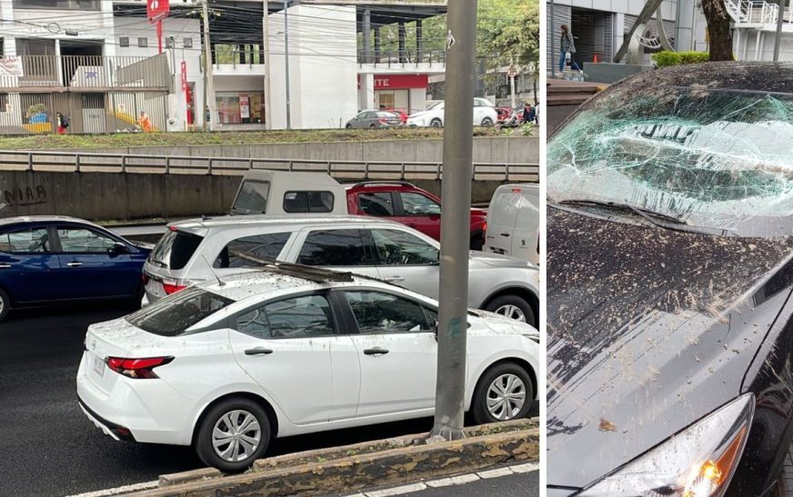 Tubo de metal cae del segundo piso del Periférico Sur; hay dos autos afectados